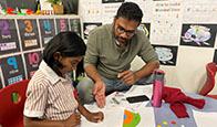 Father Helping Daughter to Study