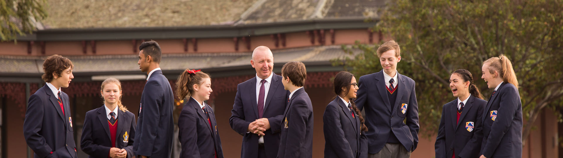 Principal Interacting With Students