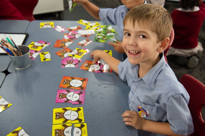 Student Playing a Puzzle Game