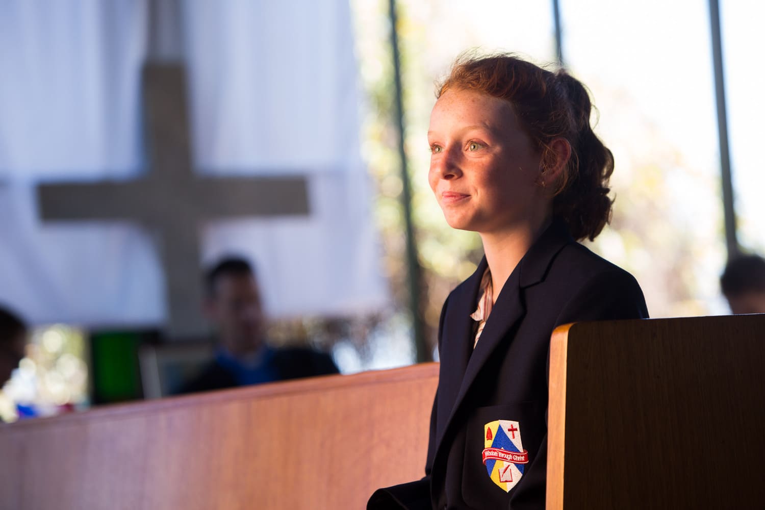 Student Smiling in the Church