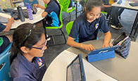 School Girls Using Tablet