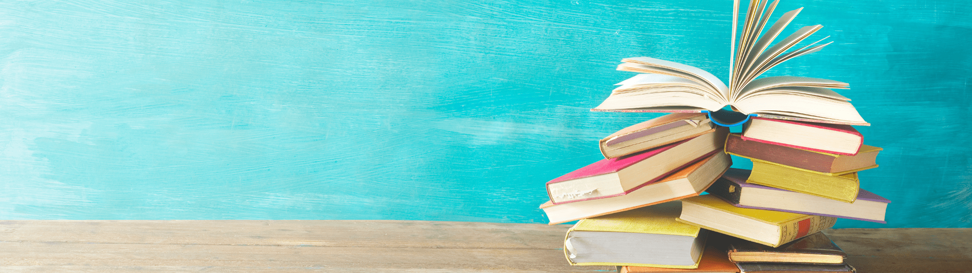 Piled Books on Desk