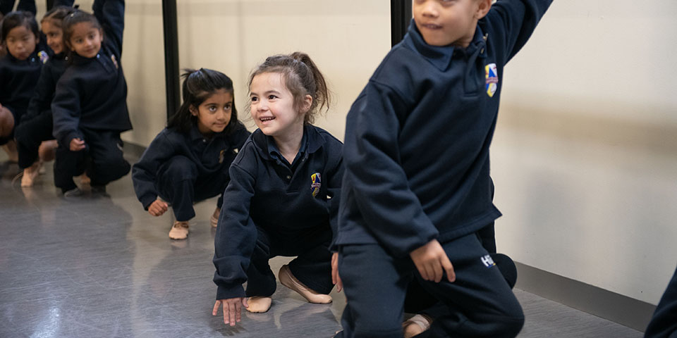 Children enjoying squatting game
